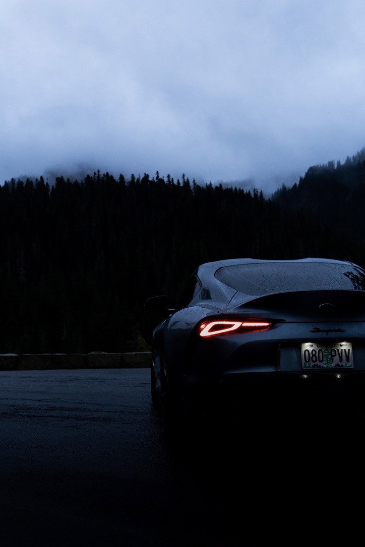 SUV driving through snowy terrain