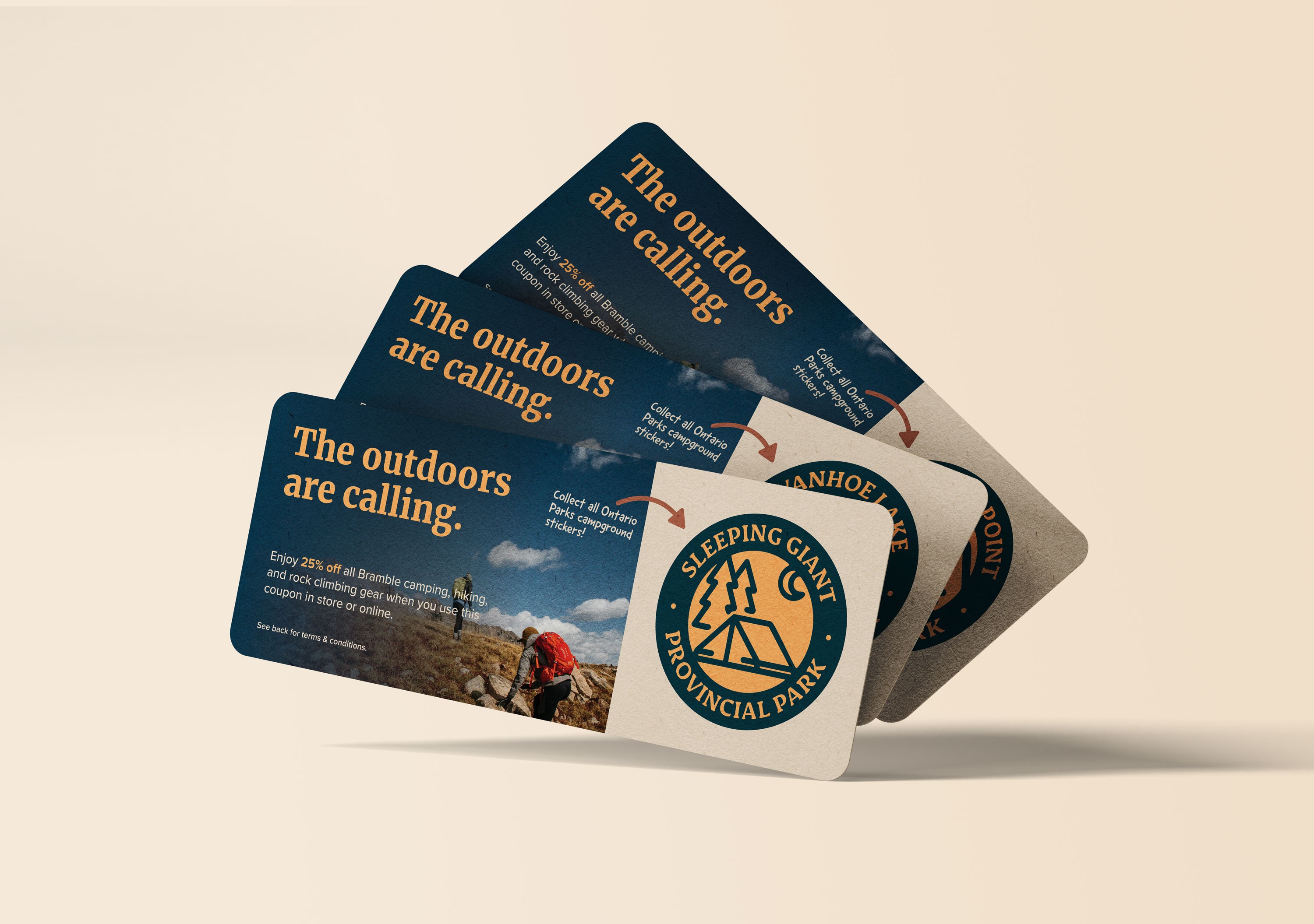 A stack of three promotional coupons for the brand Bramble is shown fanned out against a neutral cream background. Each coupon features a dark teal left-hand section with the orange headline "The outdoors are calling." and a sub-headline offering a 25% discount on camping, hiking, and rock climbing gear. The right-hand side of each card is a textured cream color and features a large, circular park badge; the top badge clearly identifies "Sleeping Giant Provincial Park" with an orange and teal illustration of a tent and trees. Tiny text on the cards encourages customers to collect all Ontario Parks campground stickers.