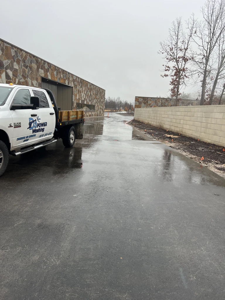 Crew performing post-construction site cleanup in Northwest Arkansas