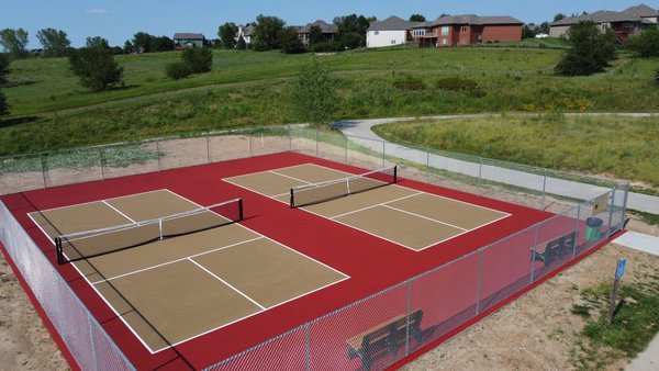 Brand-new color coating and game lines on resurfaced tennis court