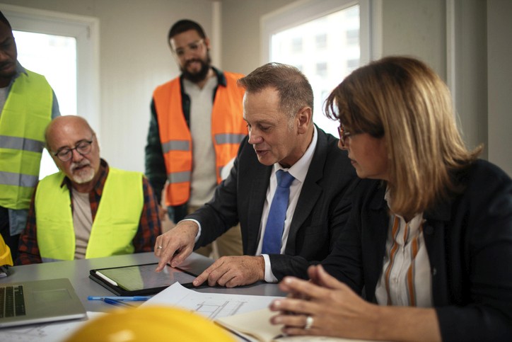 Business owner leading their team