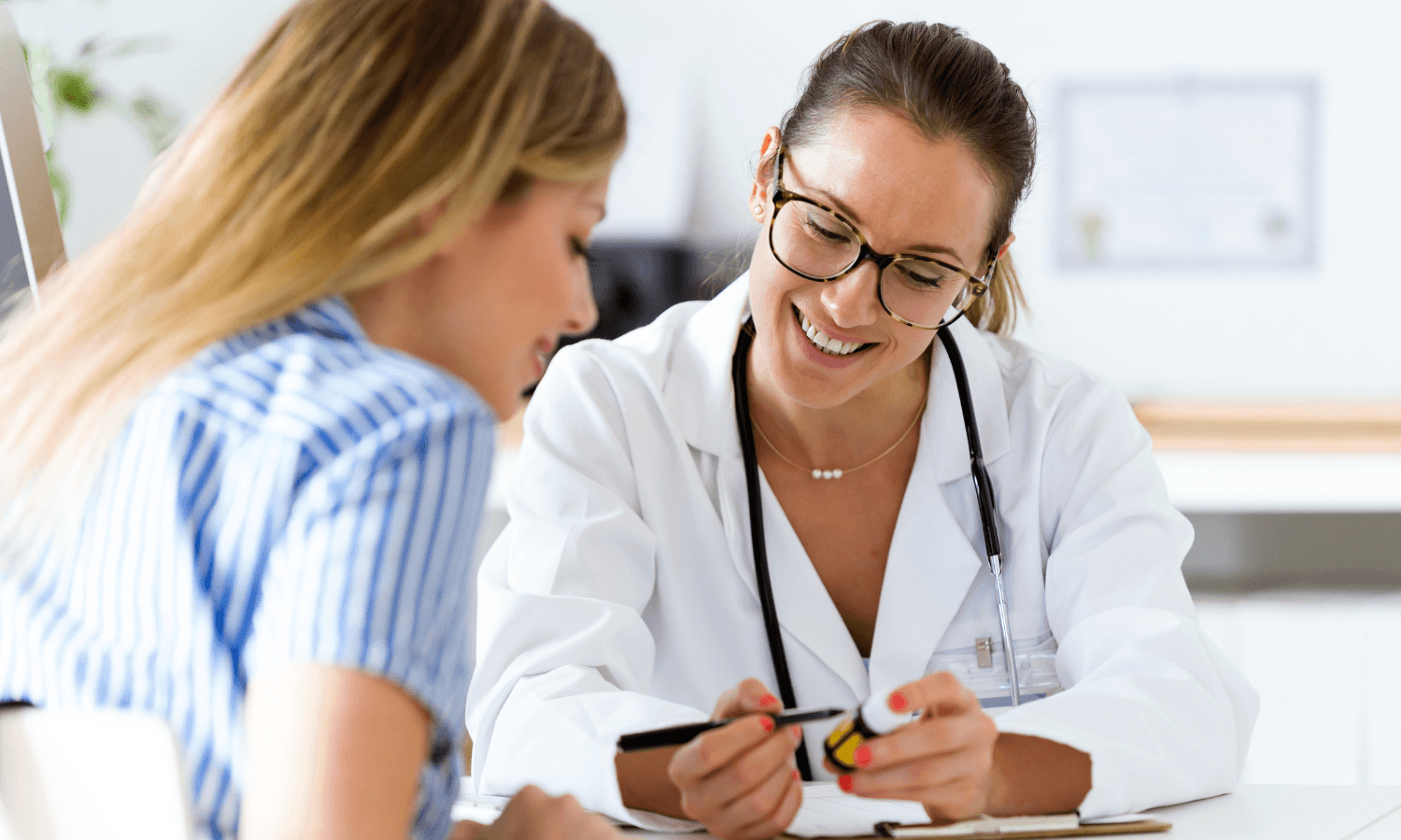 Woman talking to her doctor