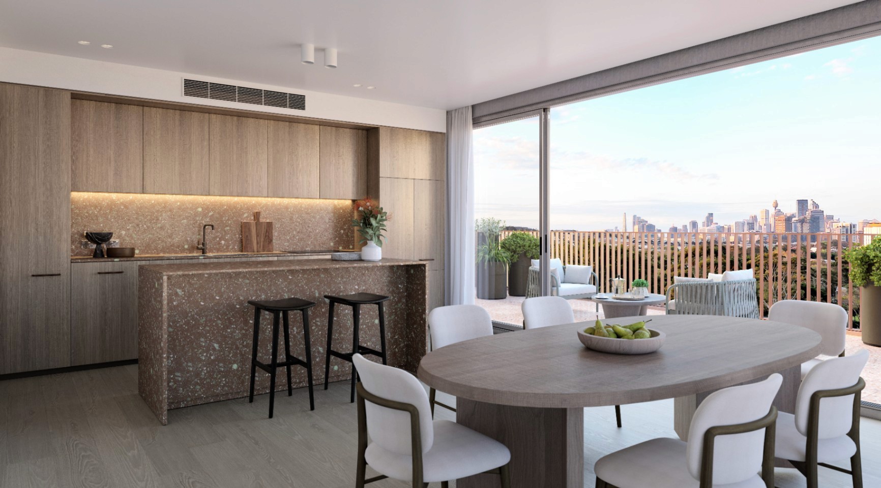 Modern kitchen and dining space at Lillian Erskineville with stone island and balcony access
