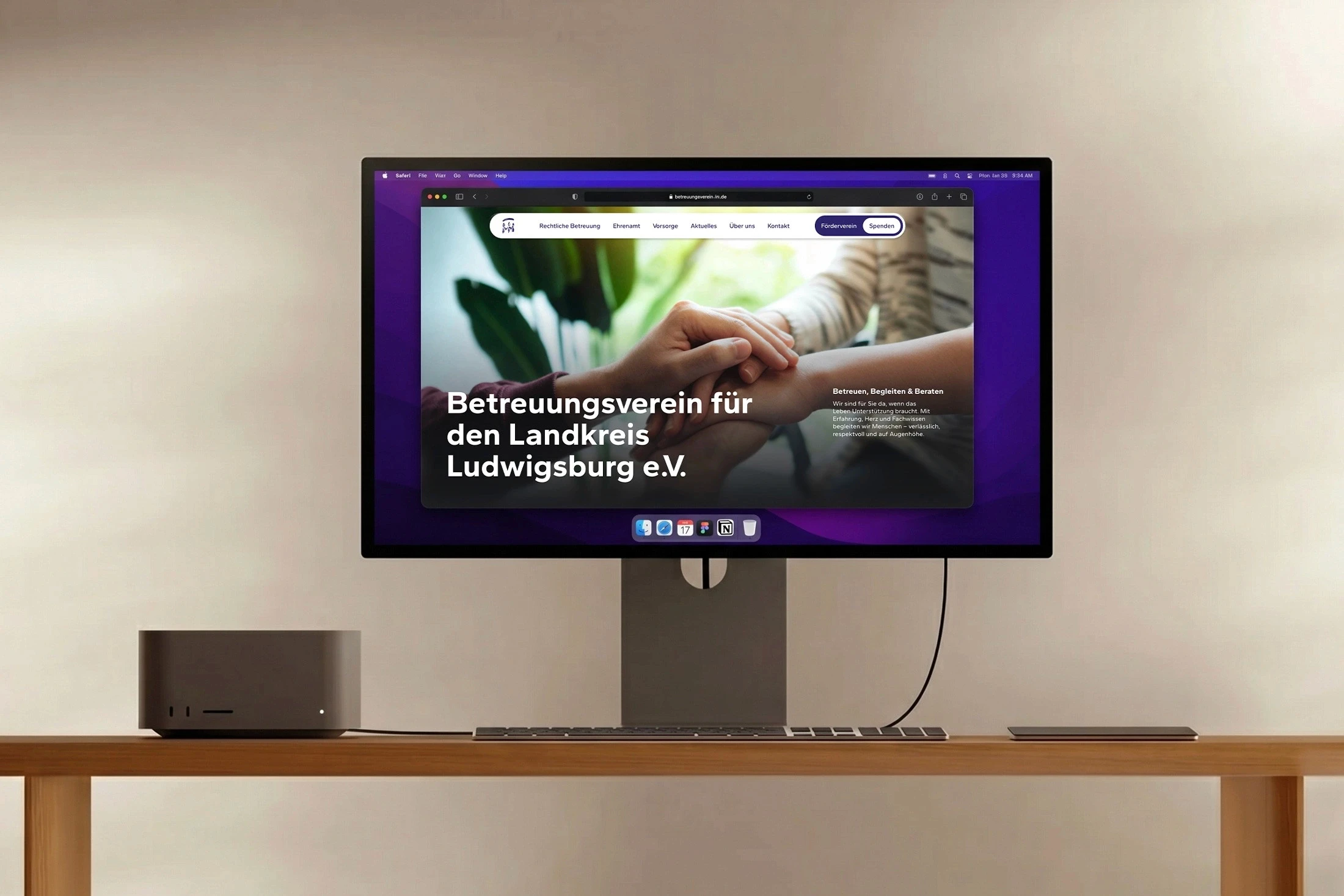 A large screen showing a presentation with flowers.