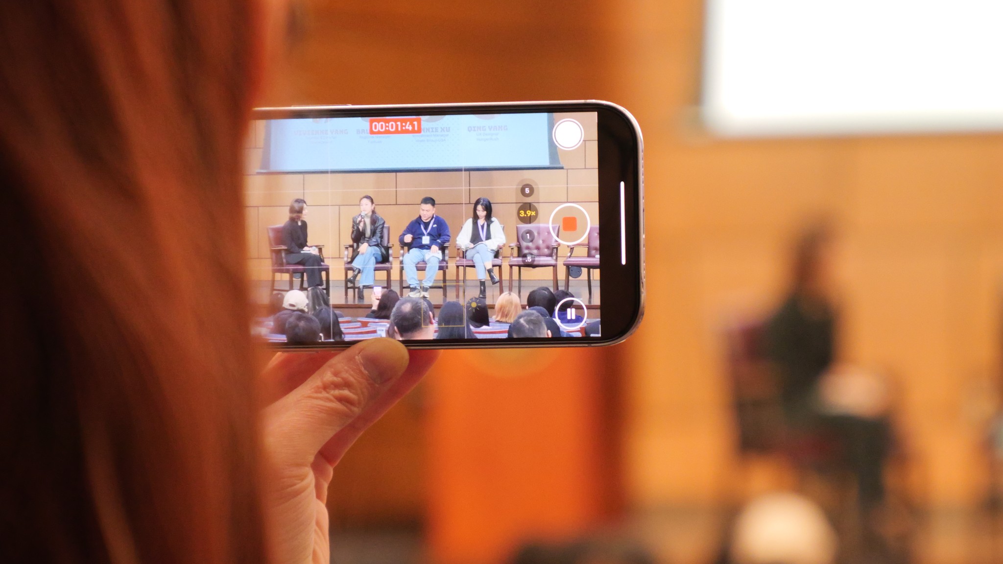 woman in blue hijab sitting on chair