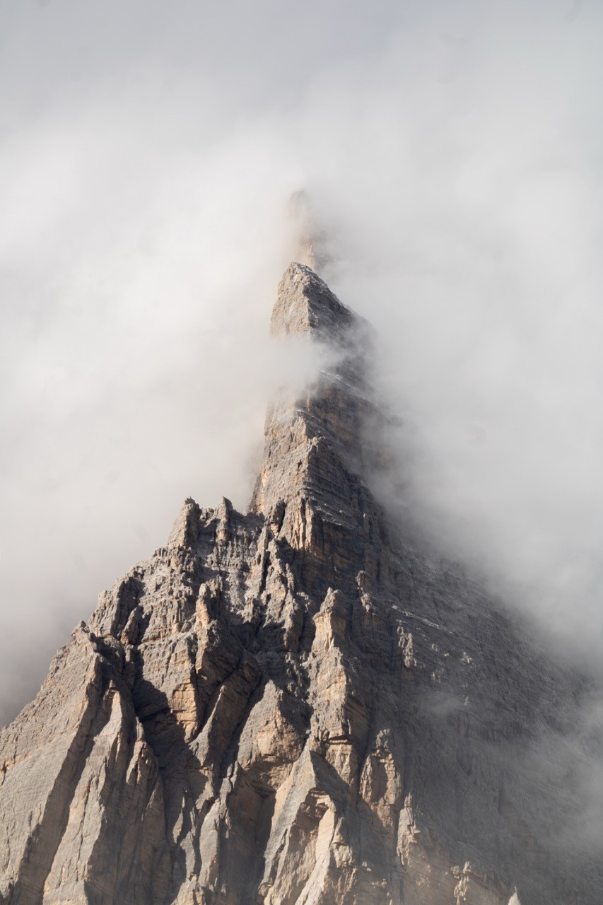 Mountain peak covered in clouds in the Dolomites