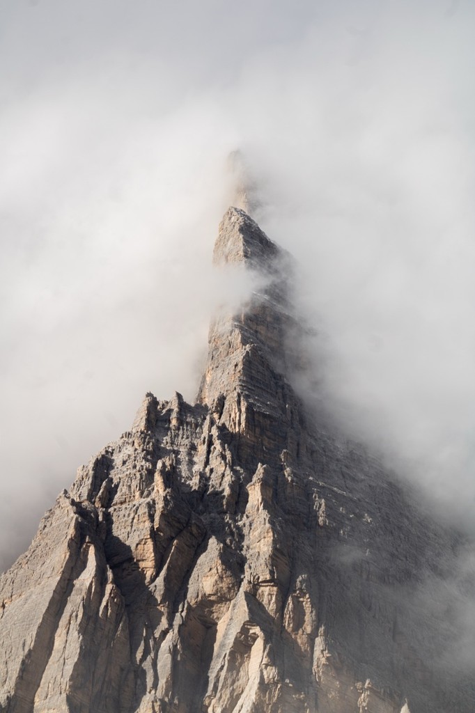 Mountain peak covered in clouds in the Dolomites