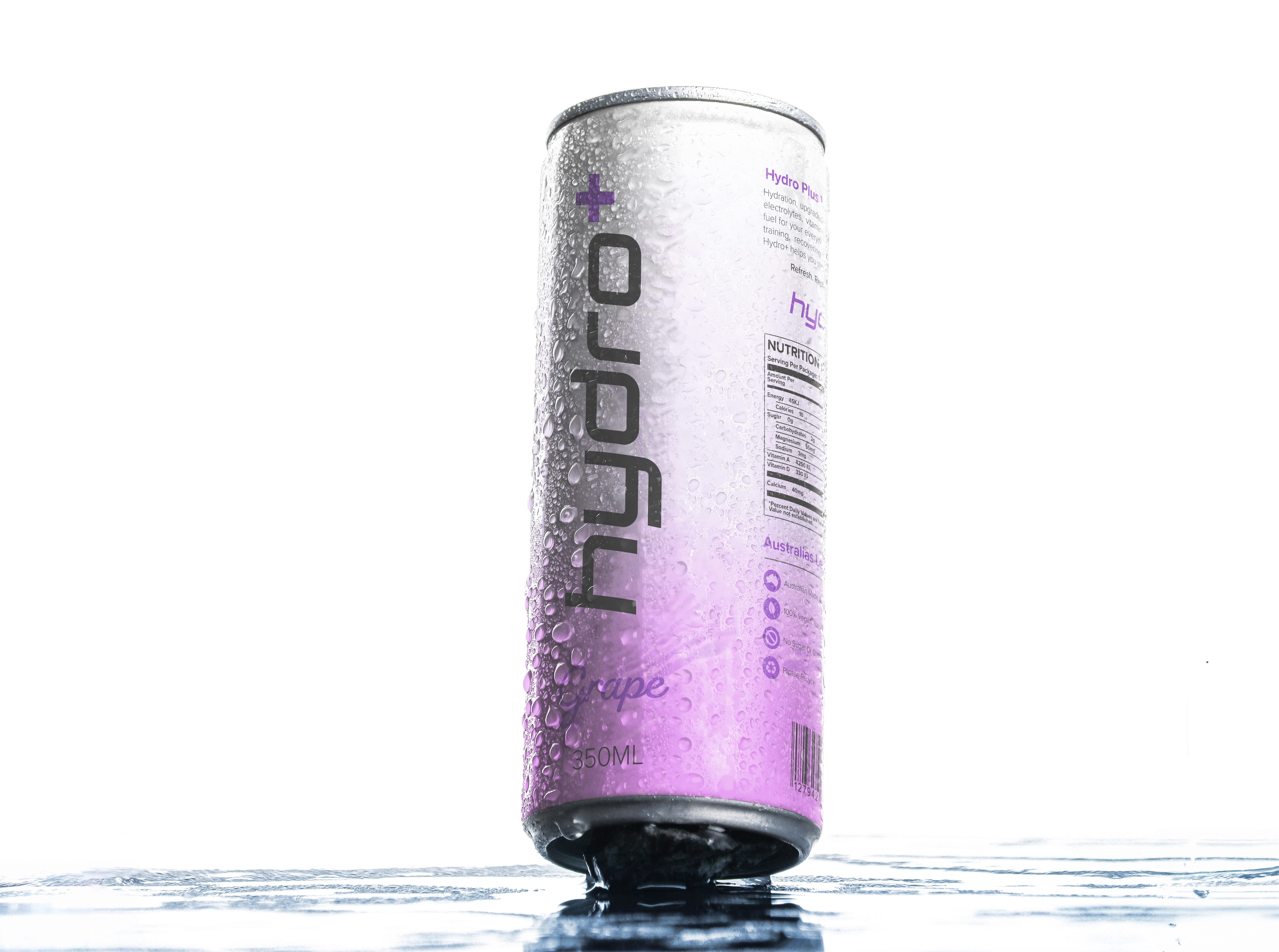 Hydro Plus grape electrolyte drink can with icy condensation.