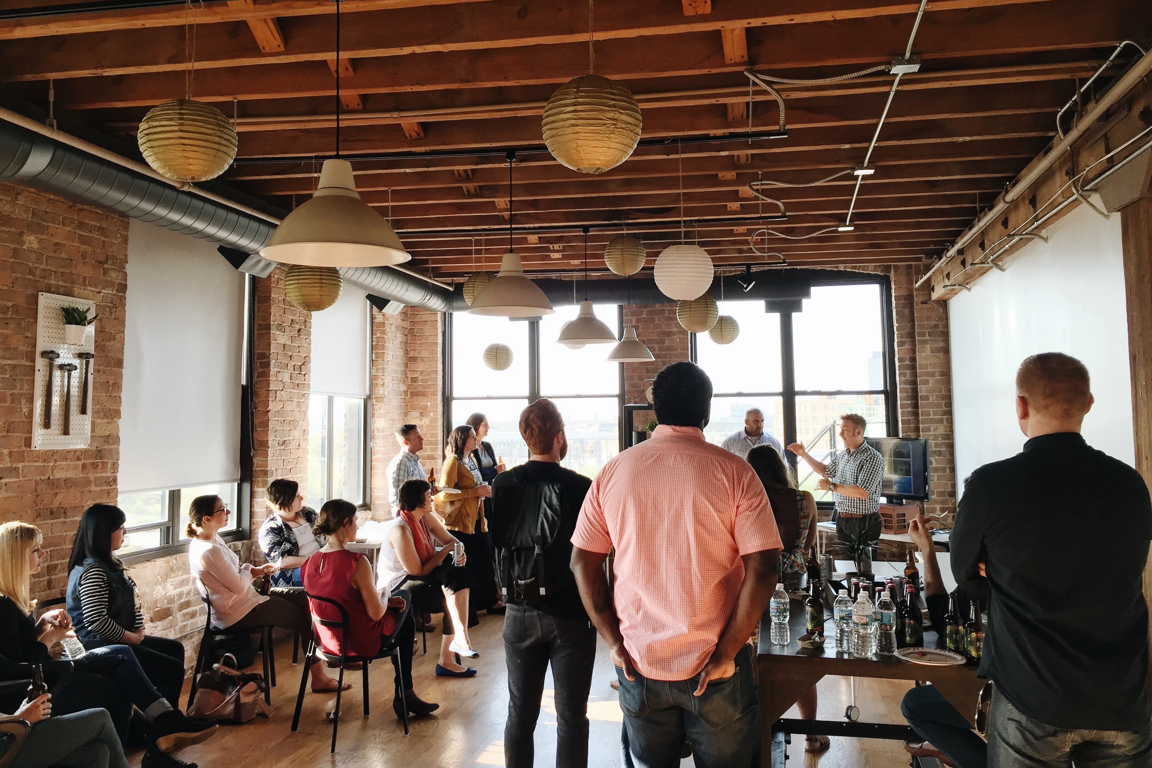 A man standing with Sufboard