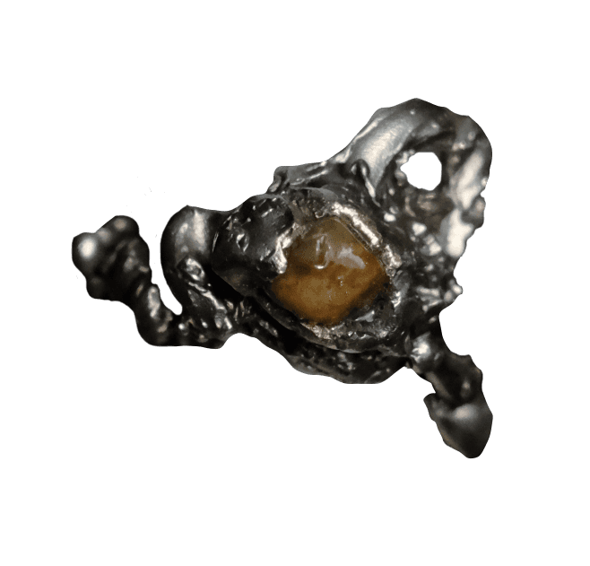 silver abstract ring with orange stone