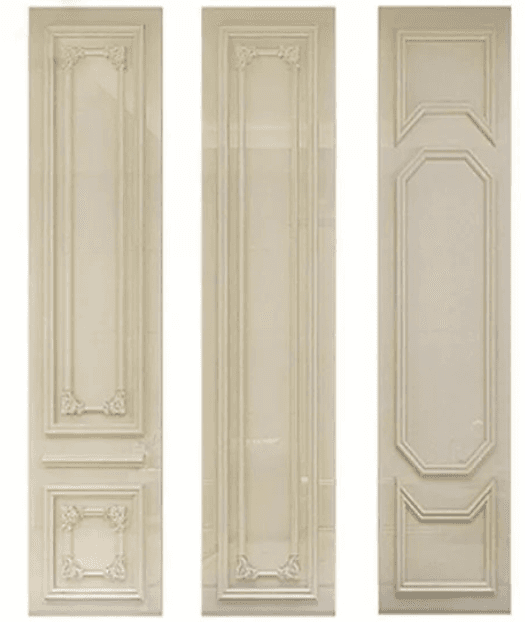 Three tall decorative wall panels with delicate carvings and classic framing details, offering a refined aesthetic to interior spaces.