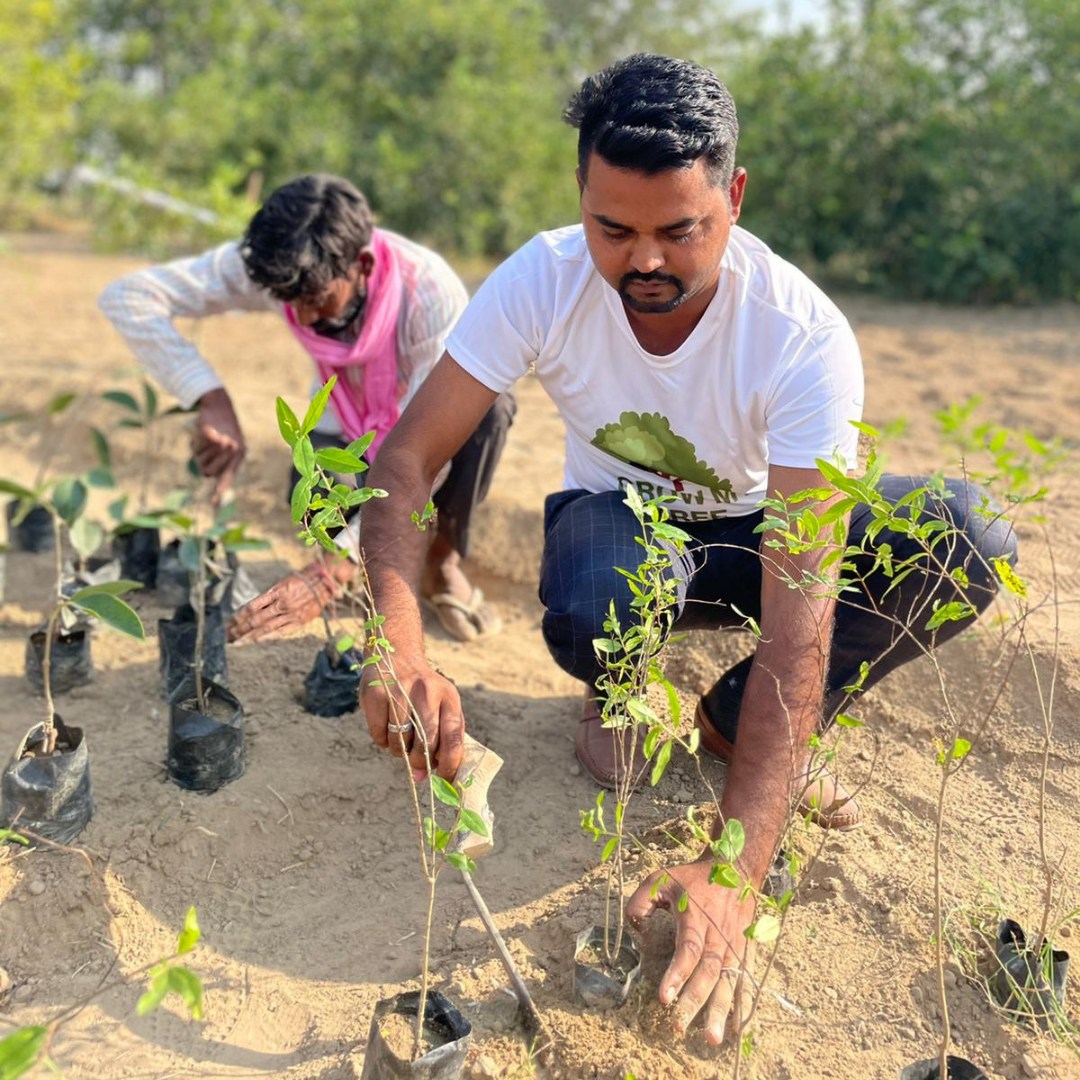 person sitting in a chair in front of a man