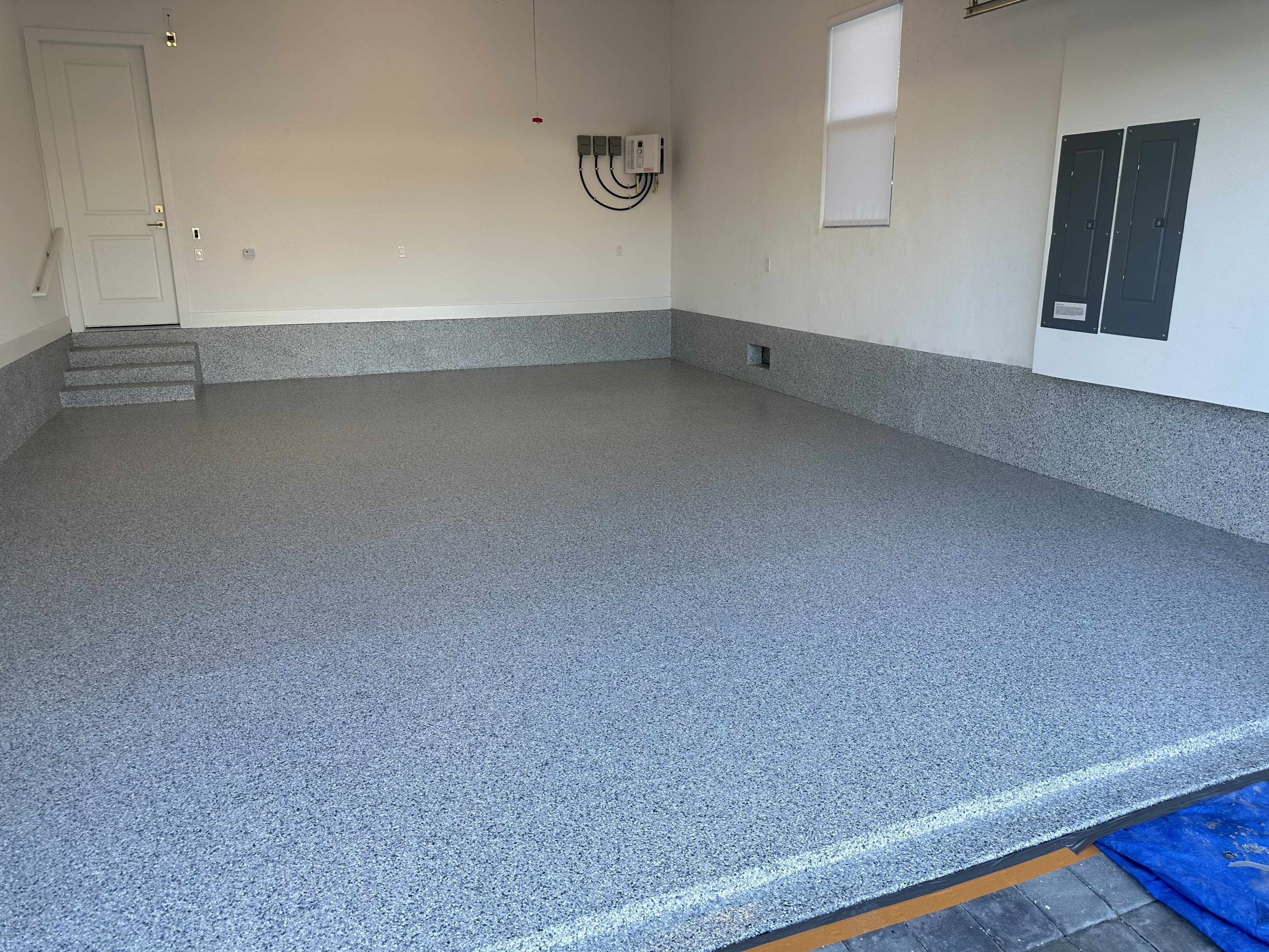 Finished garage floor coating project by CJ Epoxy