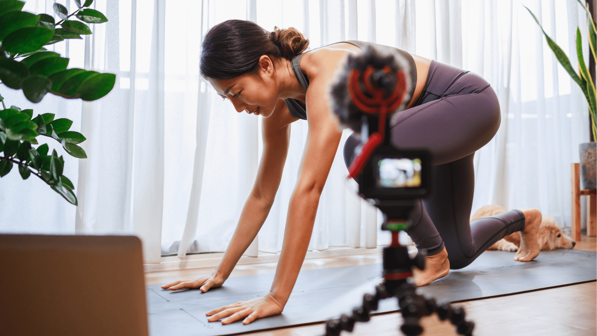 A new yoga teacher practicing teaching low lunge in an online yoga class.