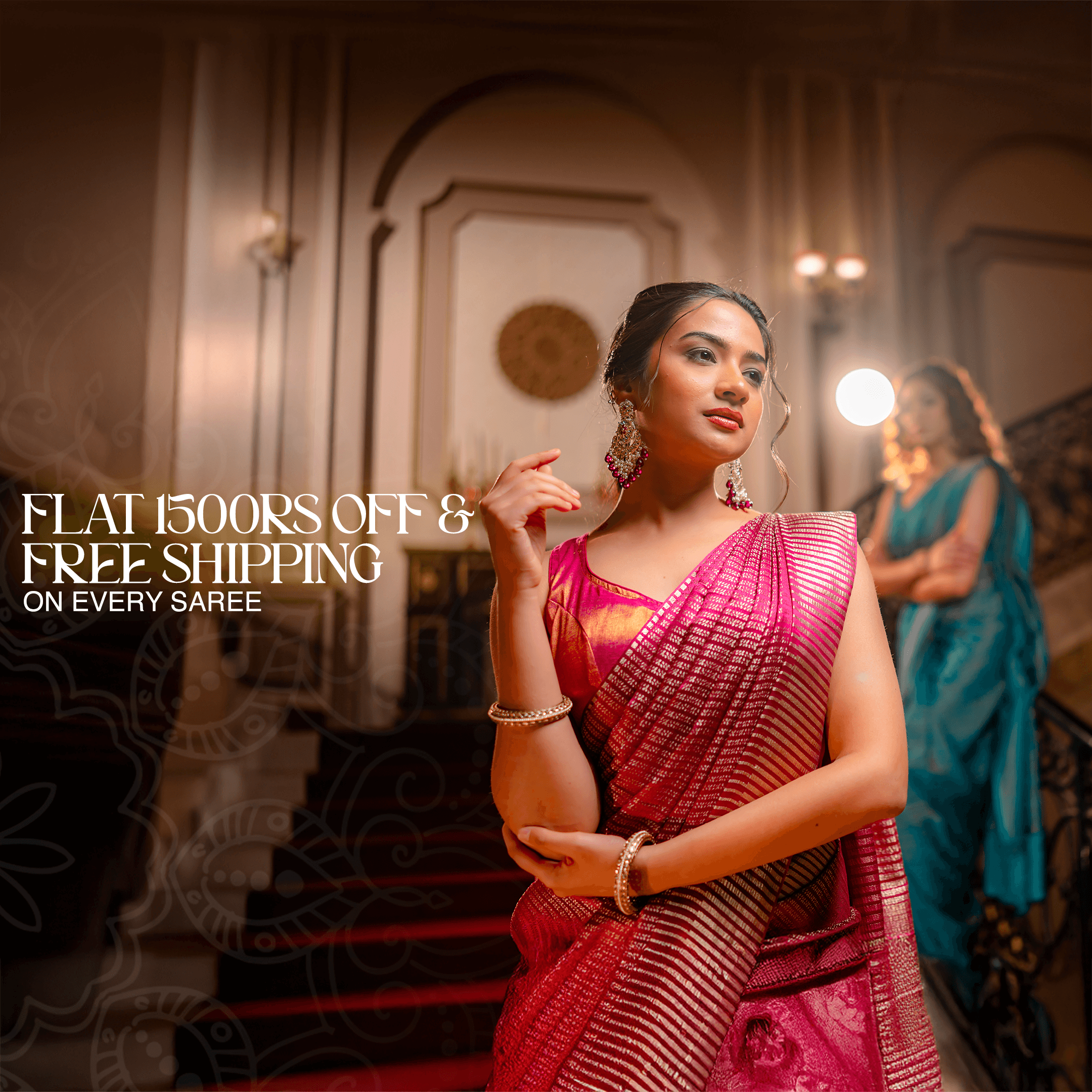 Two women standing together—one wearing a purple crepe silk saree with a pink-red contrast border and zari buttas, and the other wearing a black and white crepe saree—showcasing elegant handcrafted designs from That Saree Shop.