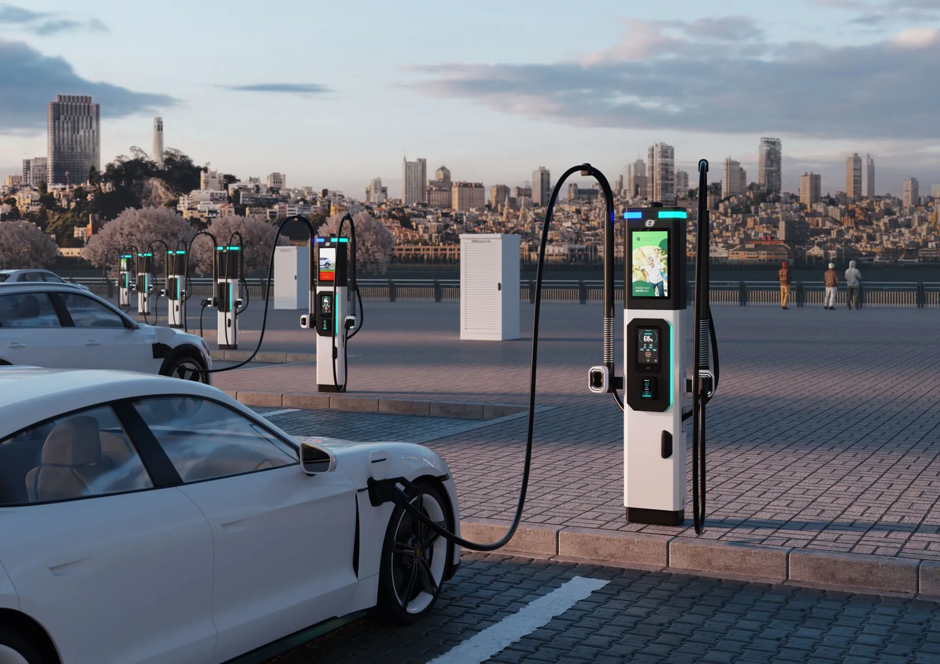 Electric cars charging at modern stations on a city street. The skyline is visible in the background under a partly cloudy sky, conveying a sustainable future.