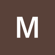 man in white button up shirt and black vest