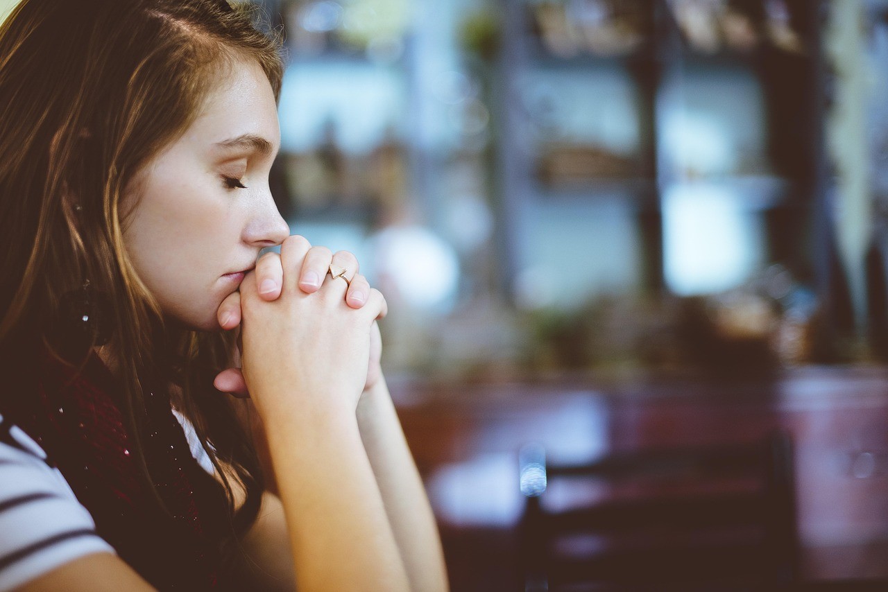  a young woman praying