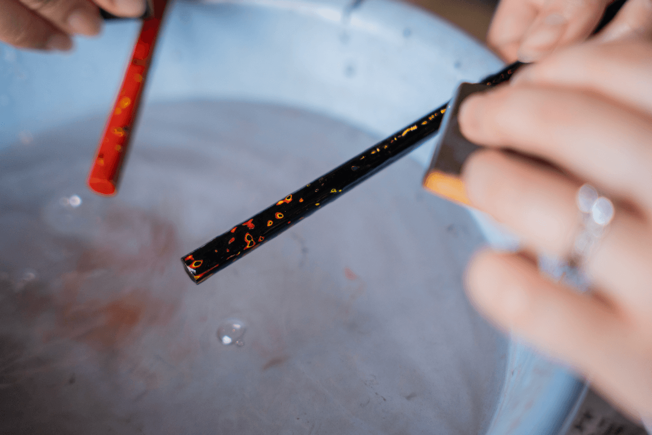 Sanding lacquerware to reveal patterns on the chopsticks
