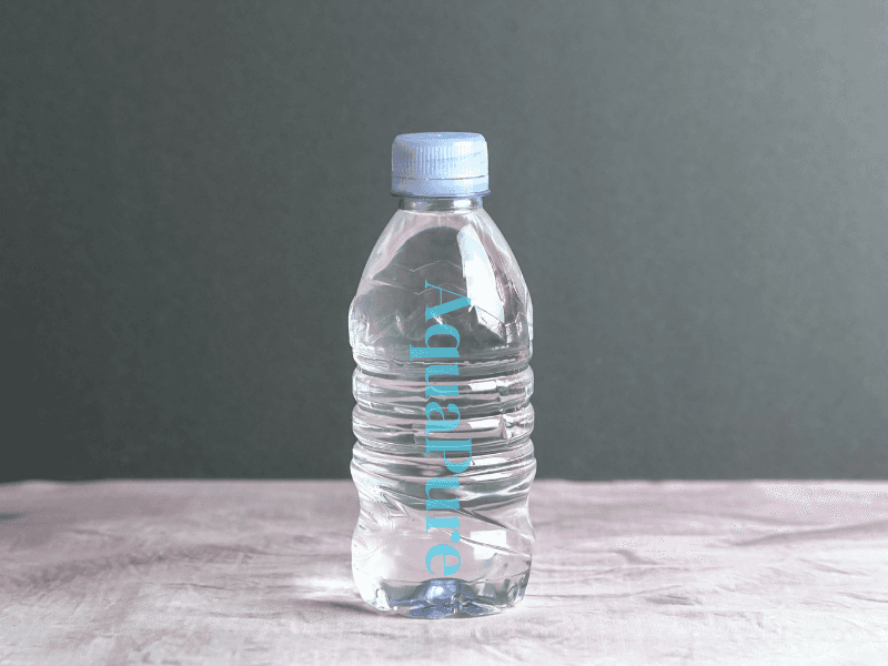 A bottle of mineral water with a brand logo