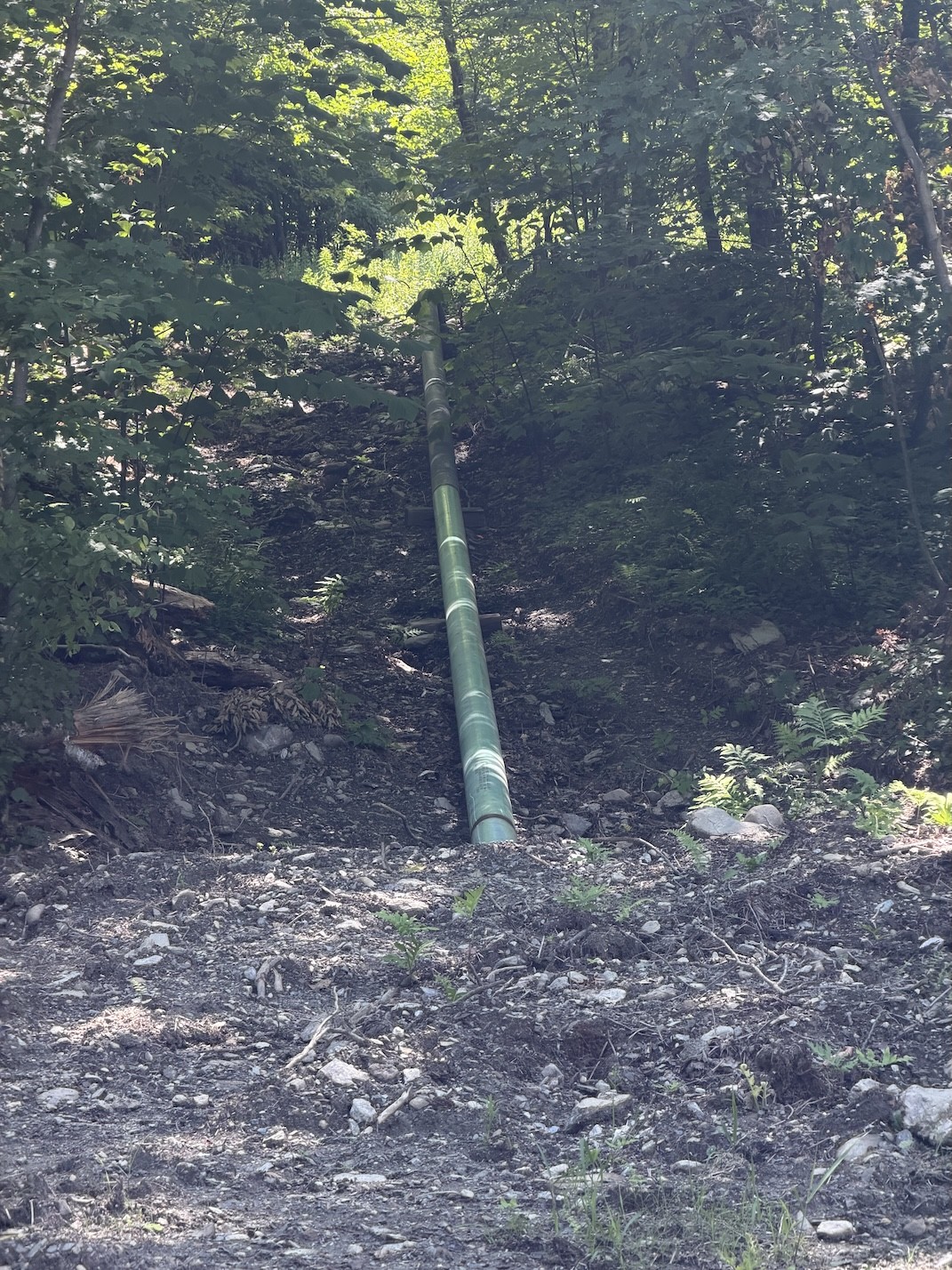 Snowmaking pipe on the mountain