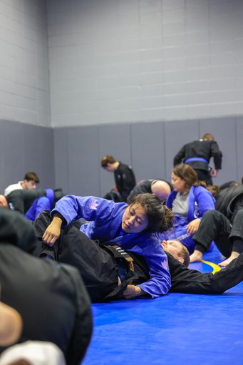 X-Guard sweep during brazilian jiu jitsu sparing