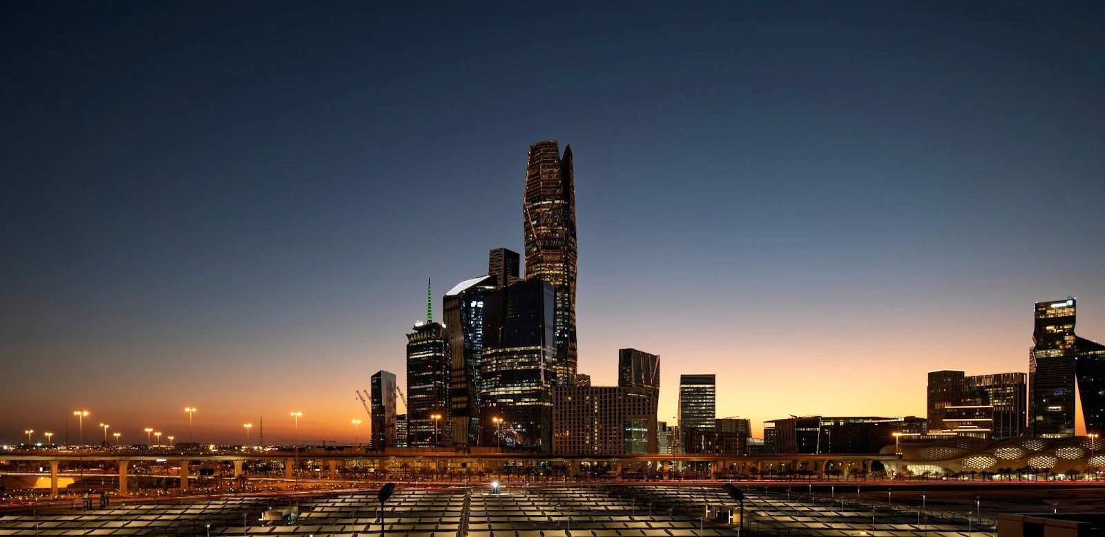 A picture showing a wide view of KAFD against the sunset background.