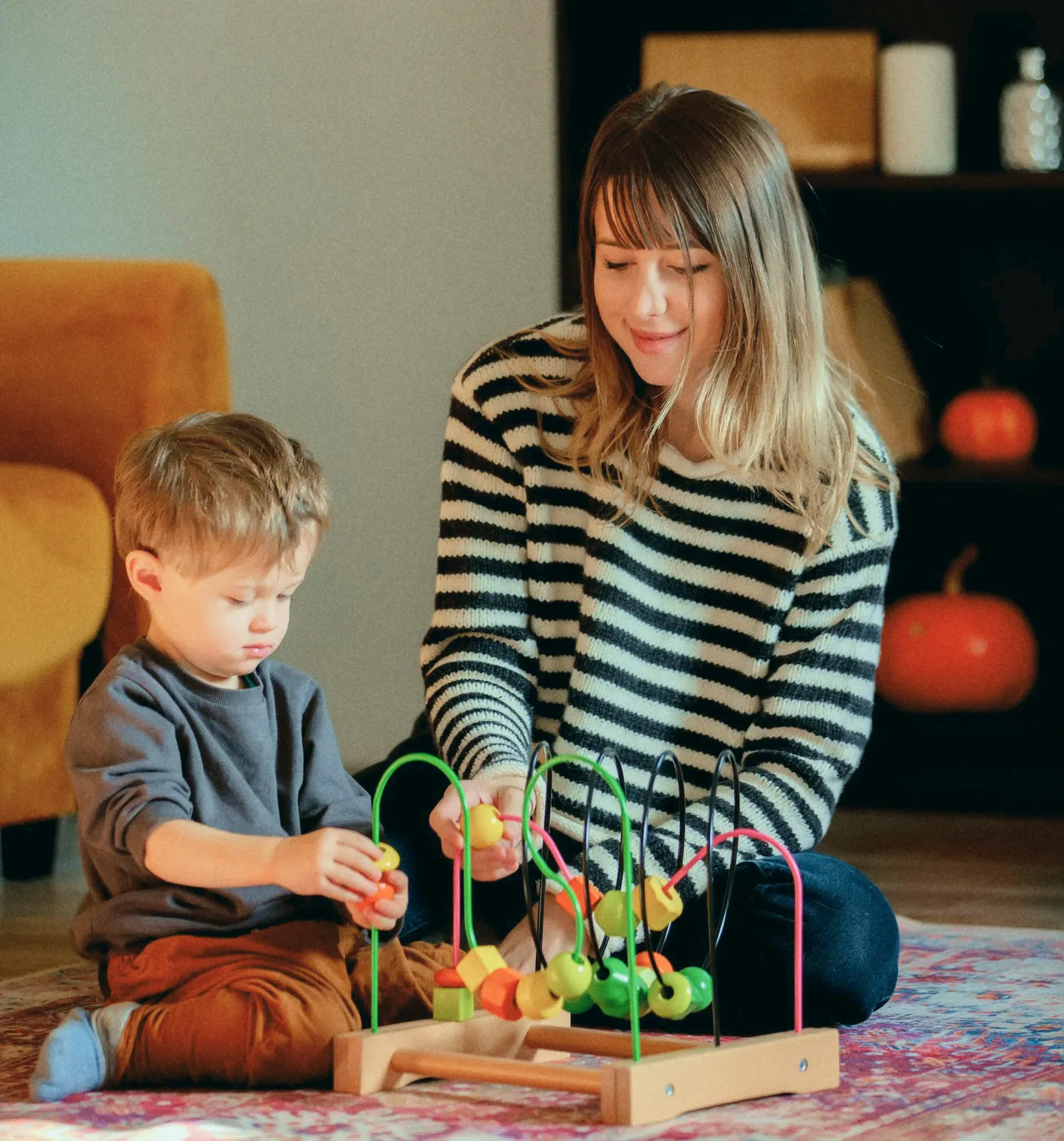 Young girl practicing speech sounds with a pediatric speech therapist