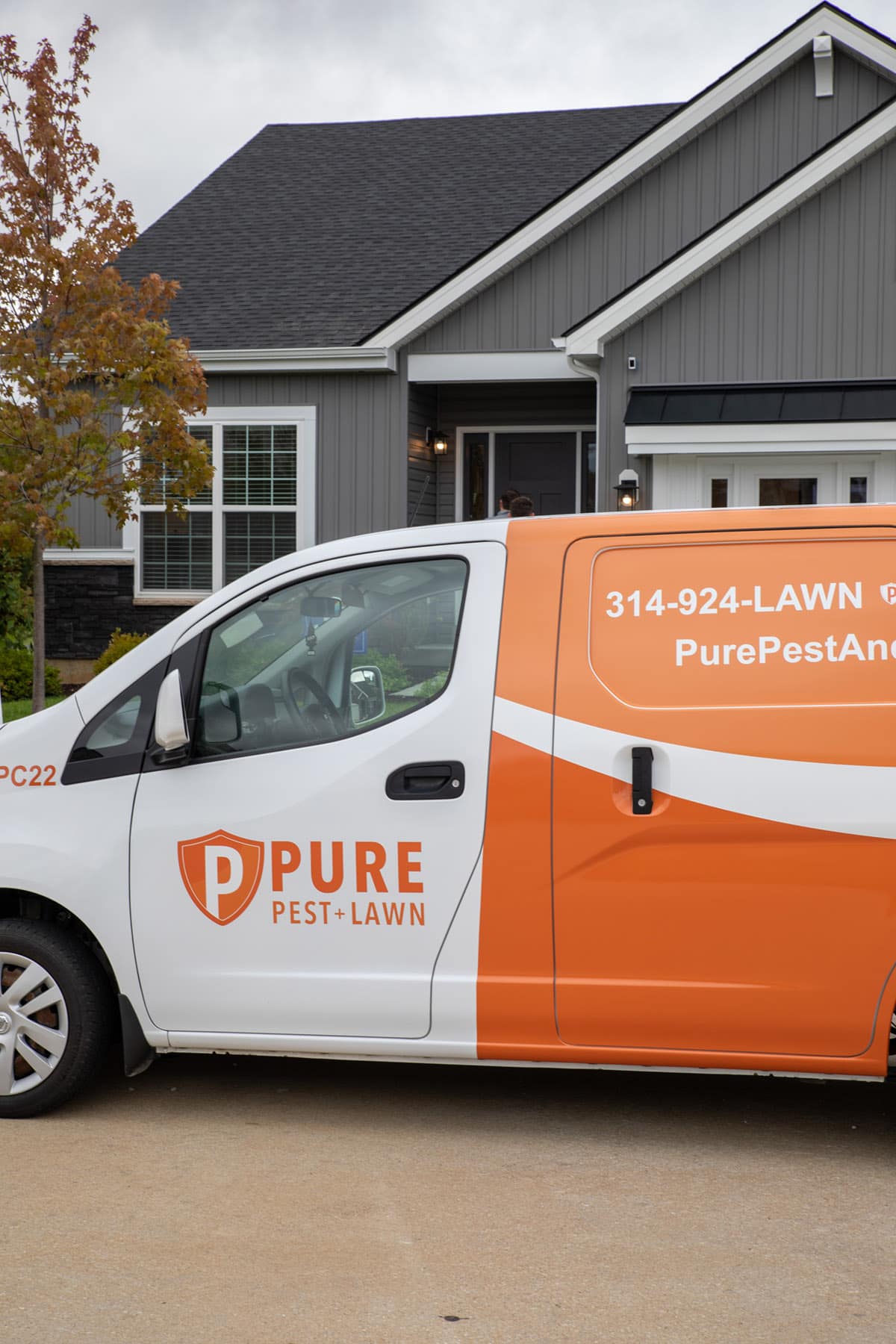 A photo of a clean and professional Pure Pest + Lawn van