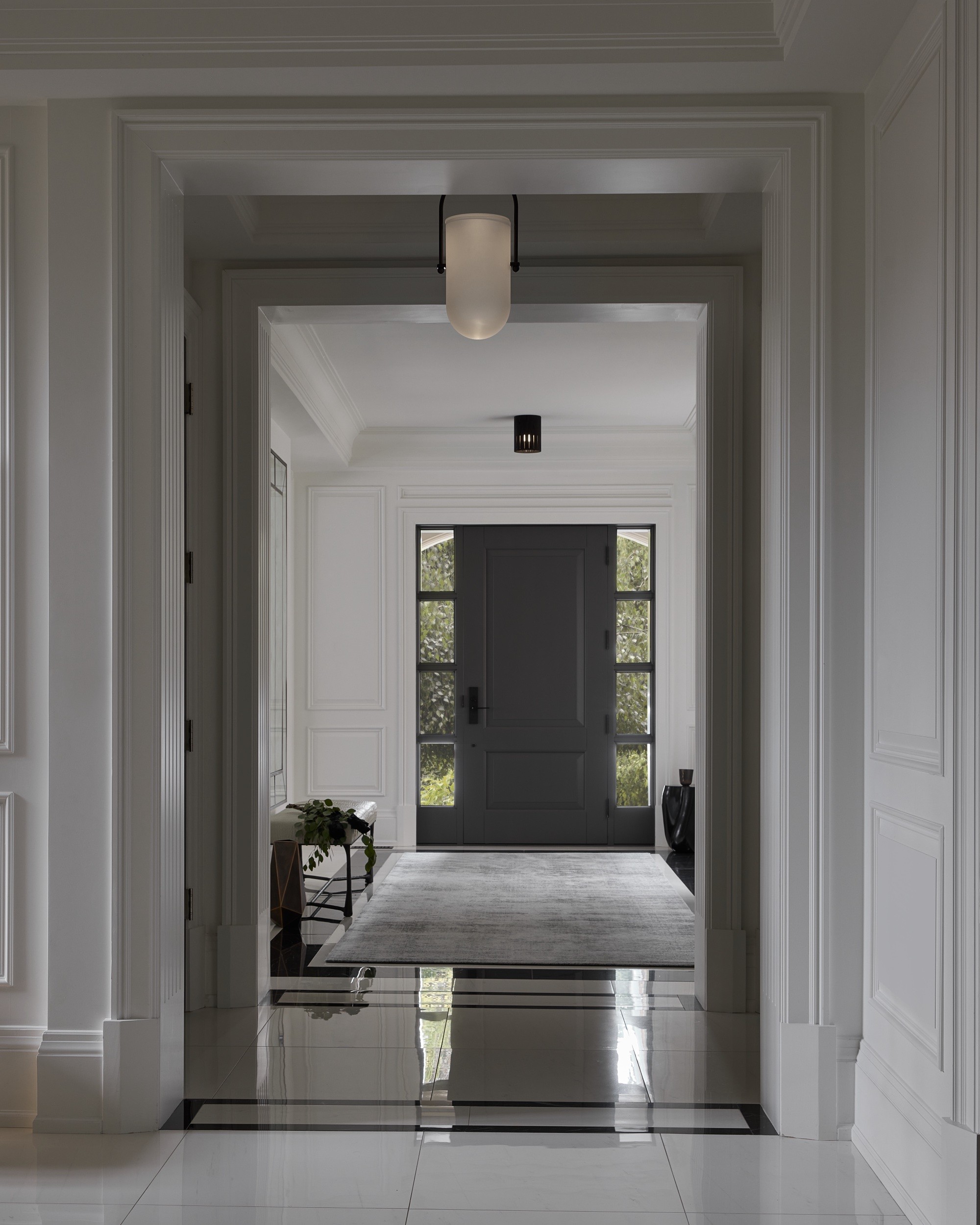 The entrance hall of a Forest Hill home, looking through to the front door, by Kim Lambert Design