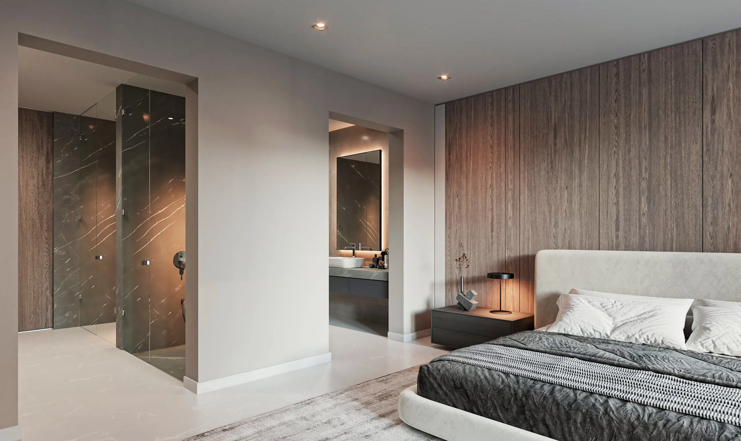 A modern bedroom featuring a neatly made bed and an adjoining bathroom visible in the background.