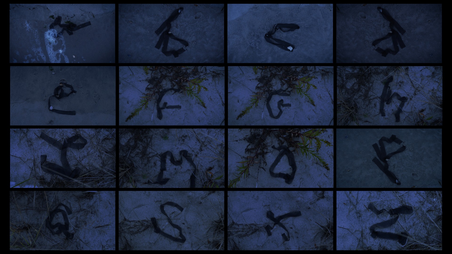 stips of materials forming letters in a grid pattern