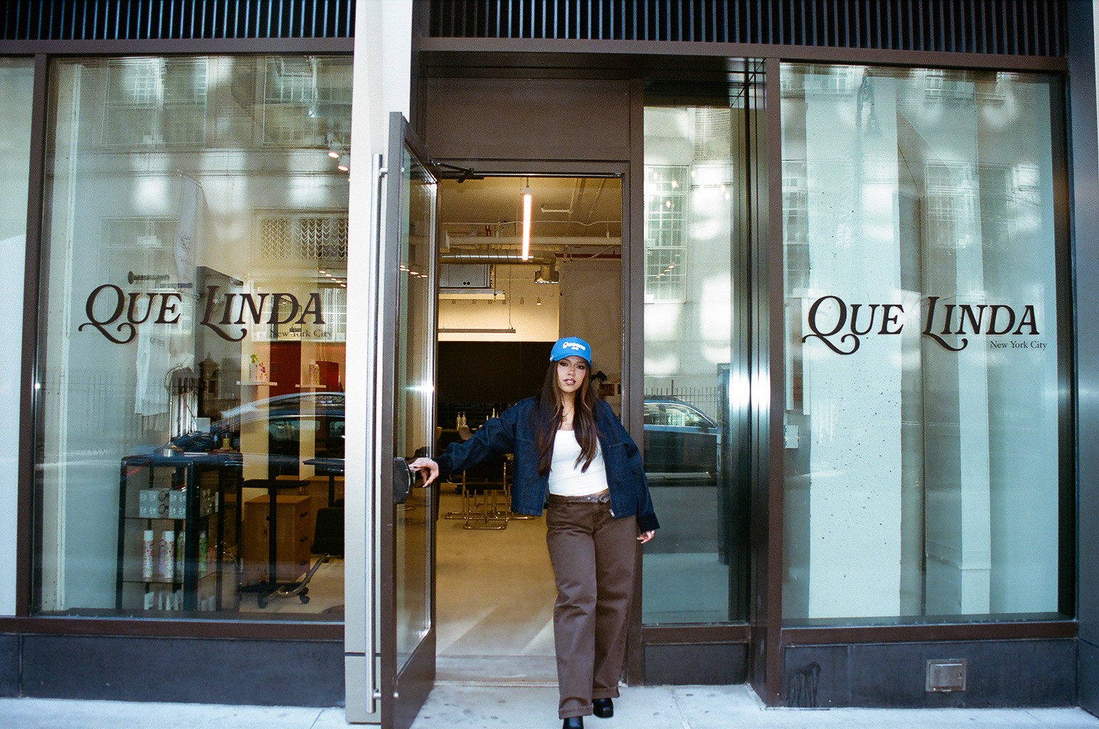 Que Linda NYC salon location — corner of Broome St and Ludlow St in Lower East Side Manhattan. Latina-owned NYC hair salon offering custom hair color, precision cuts, seamless extensions, and textured hair services.