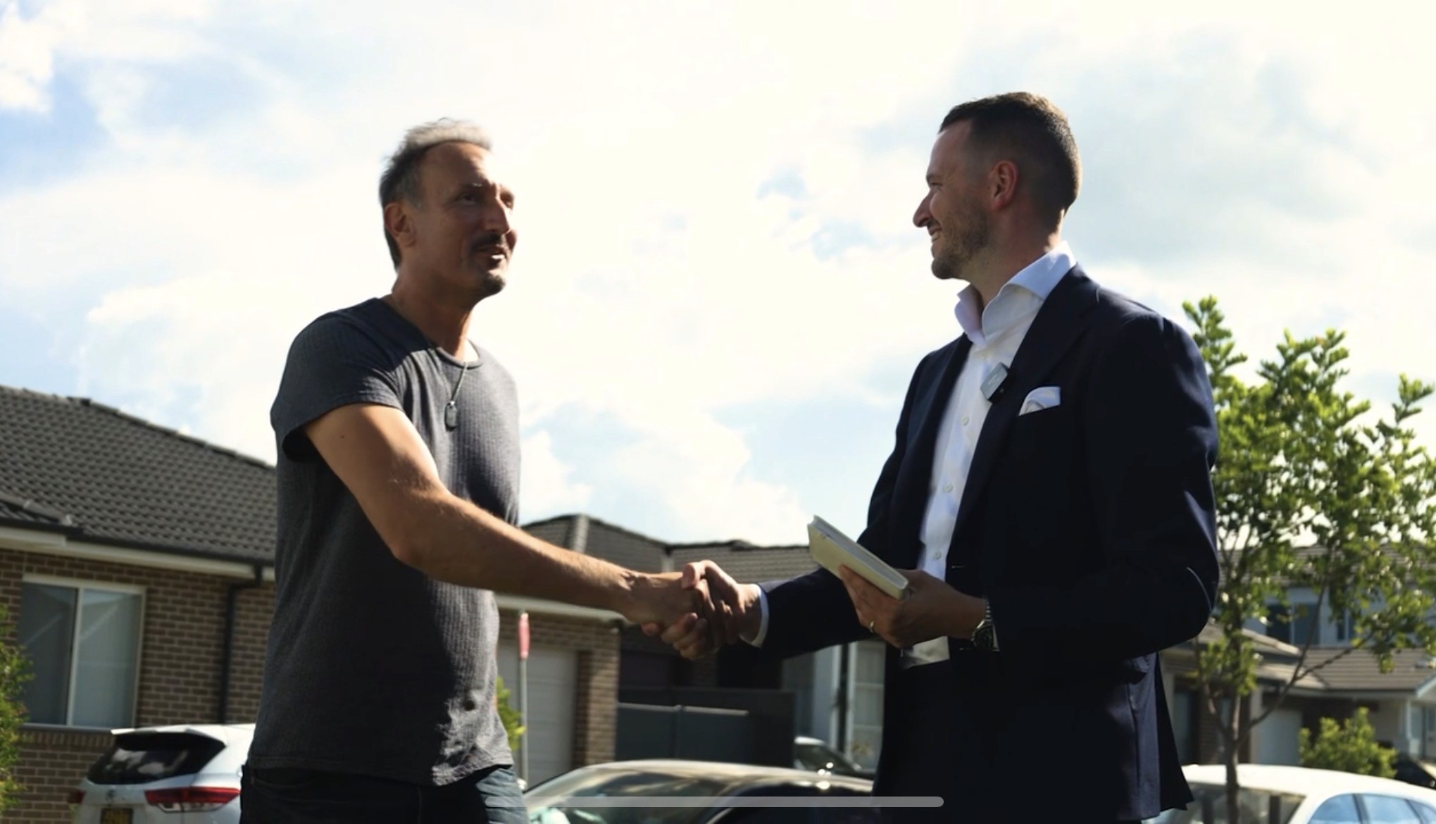 Oceanfront modern house on rocky cliff at dusk, Tidewatch Retreat