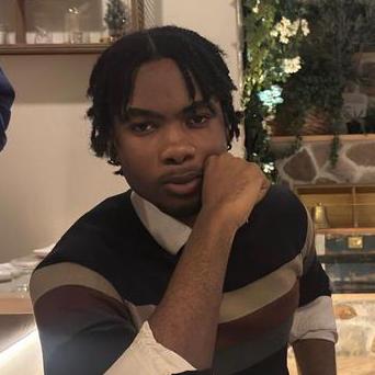 grayscale photo of man facing right