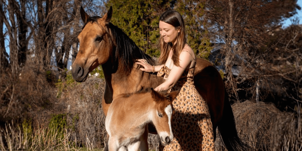 Founder Noelle Lynne at Karma Ranch, blending eco-tourism, sustainability, and animal welfare to create a unique sanctuary in Montana.