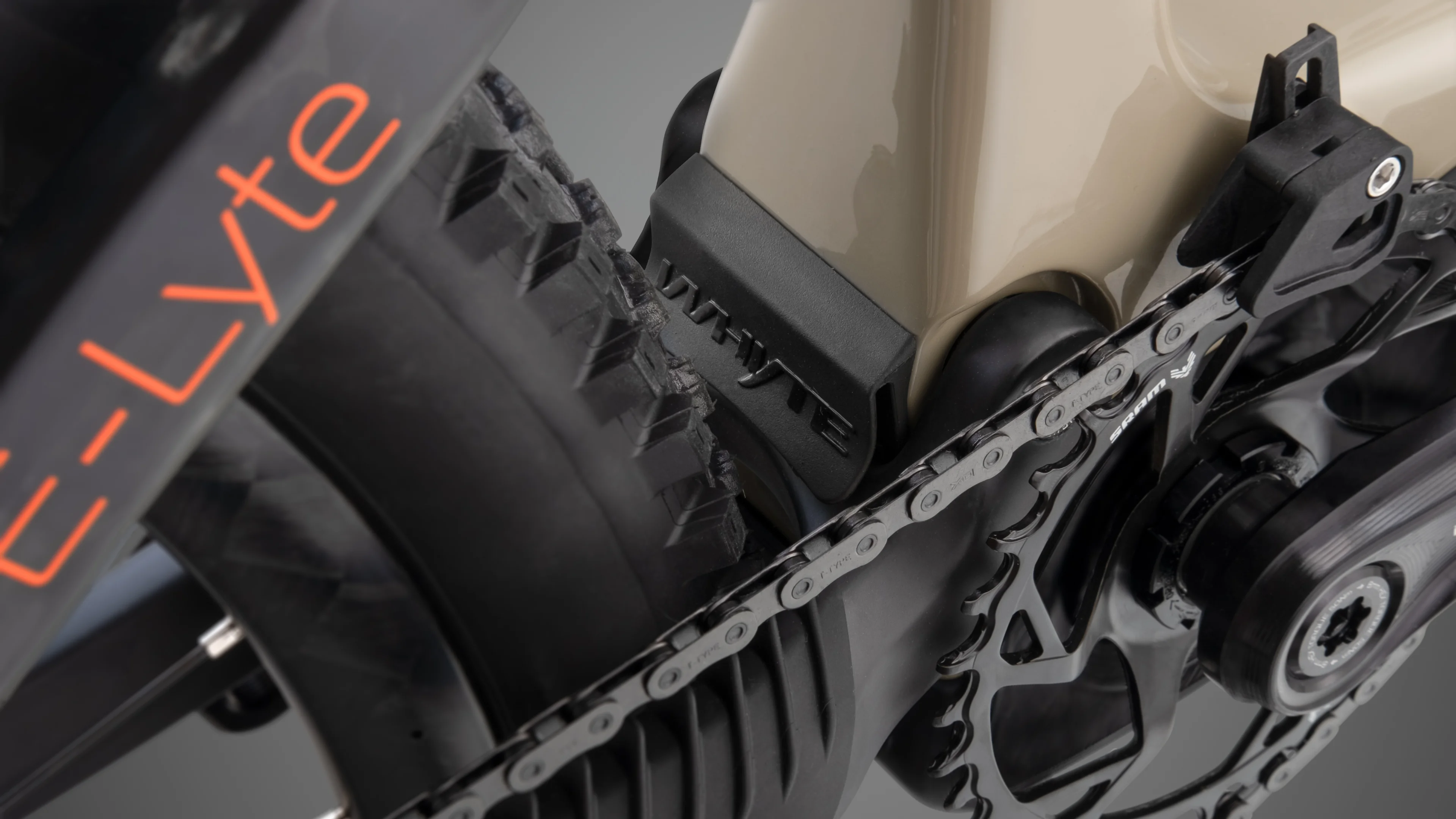 Macro detail of Elyte e-bike drivetrain featuring chainring, derailleur system, and precision-machined components for high-performance shifting.