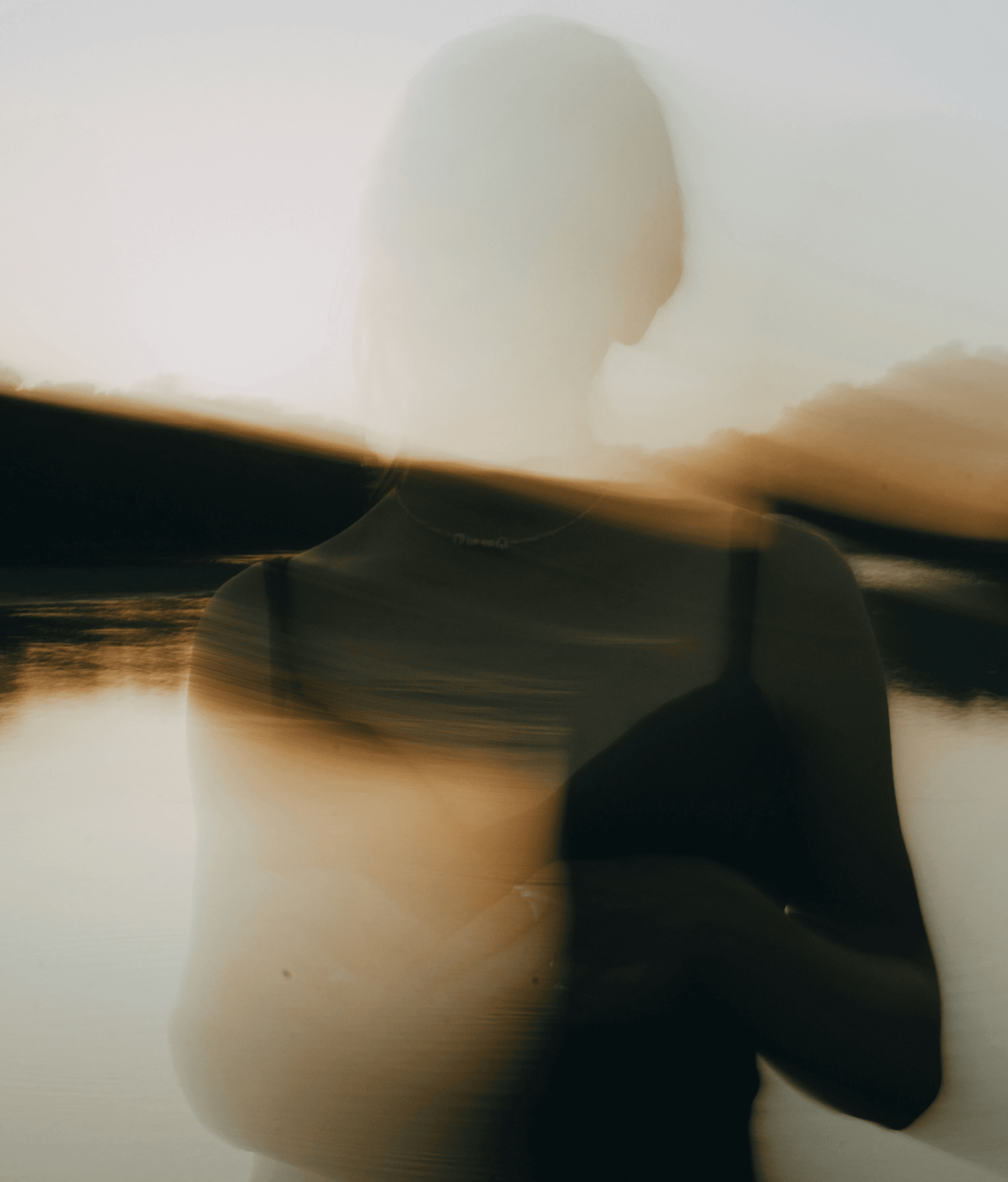 a person holding a surfboard