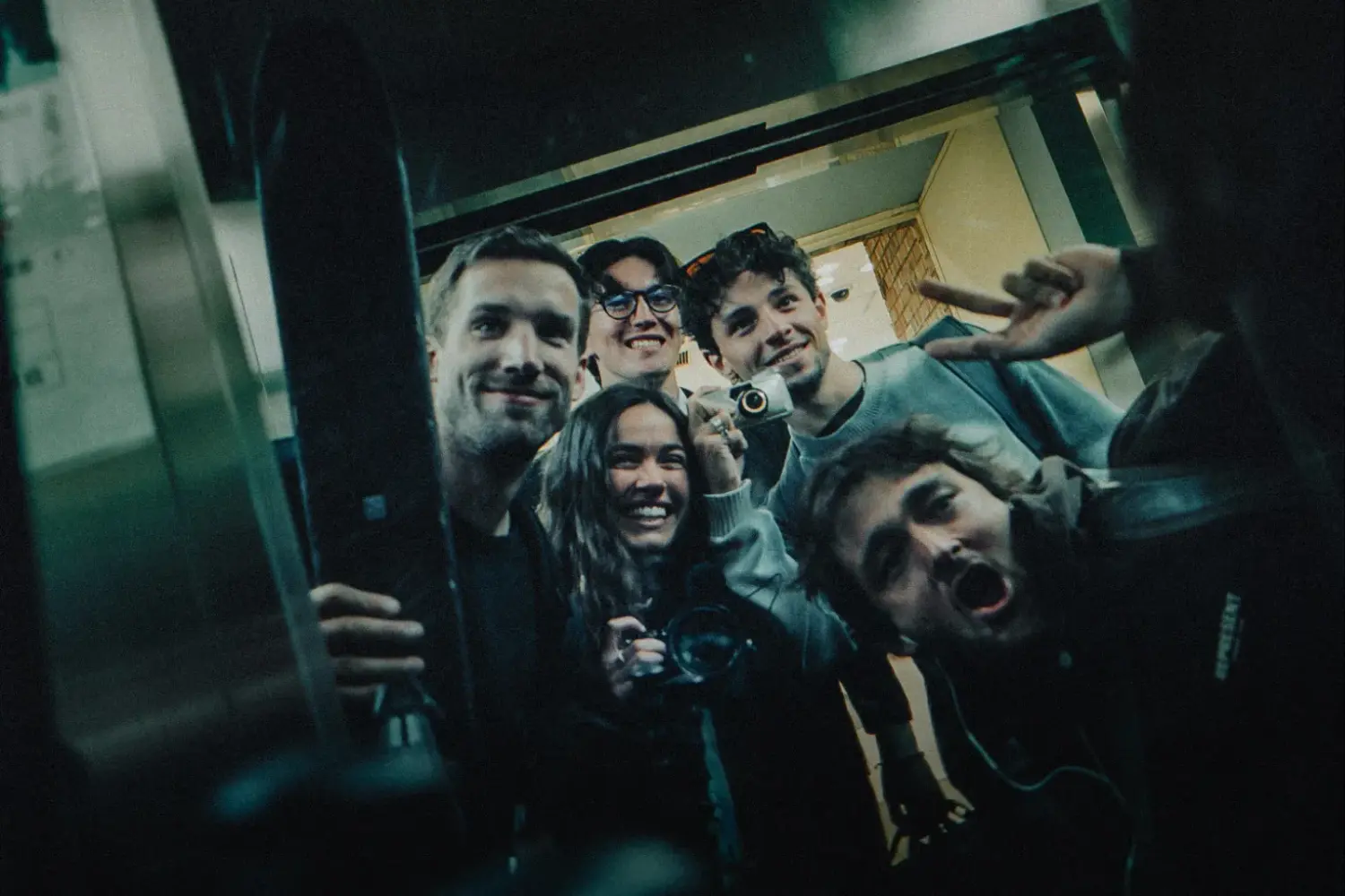 Reilin and Moos posing for a picture with their crew