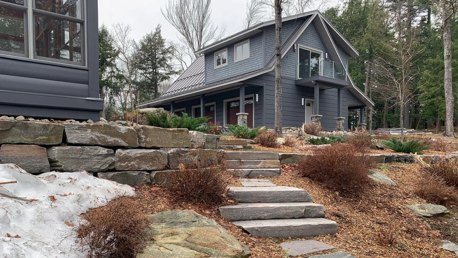 Kenisis lake cottage with custom muskoka granite stonework.