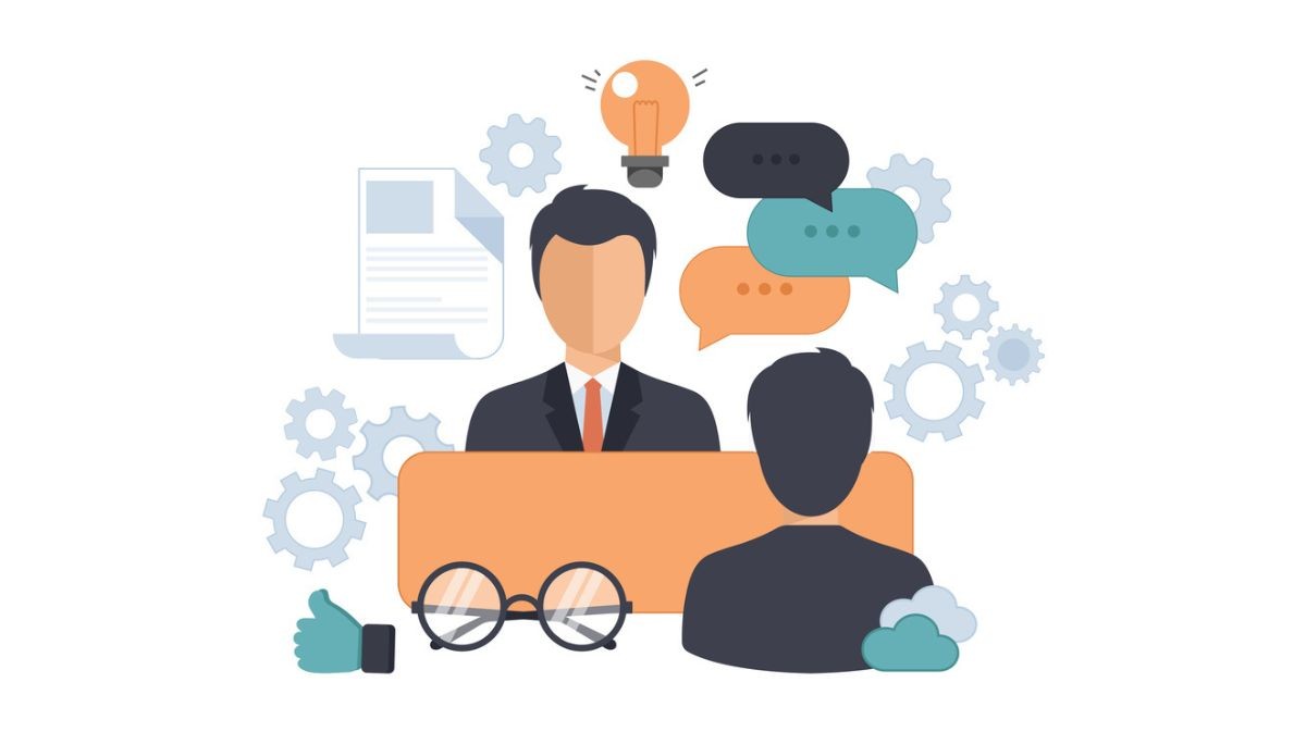 Illustration of two professionals in conversation surrounded by icons for communication, ideas, and collaboration—representing various job interview formats and styles explored in a complete guide.