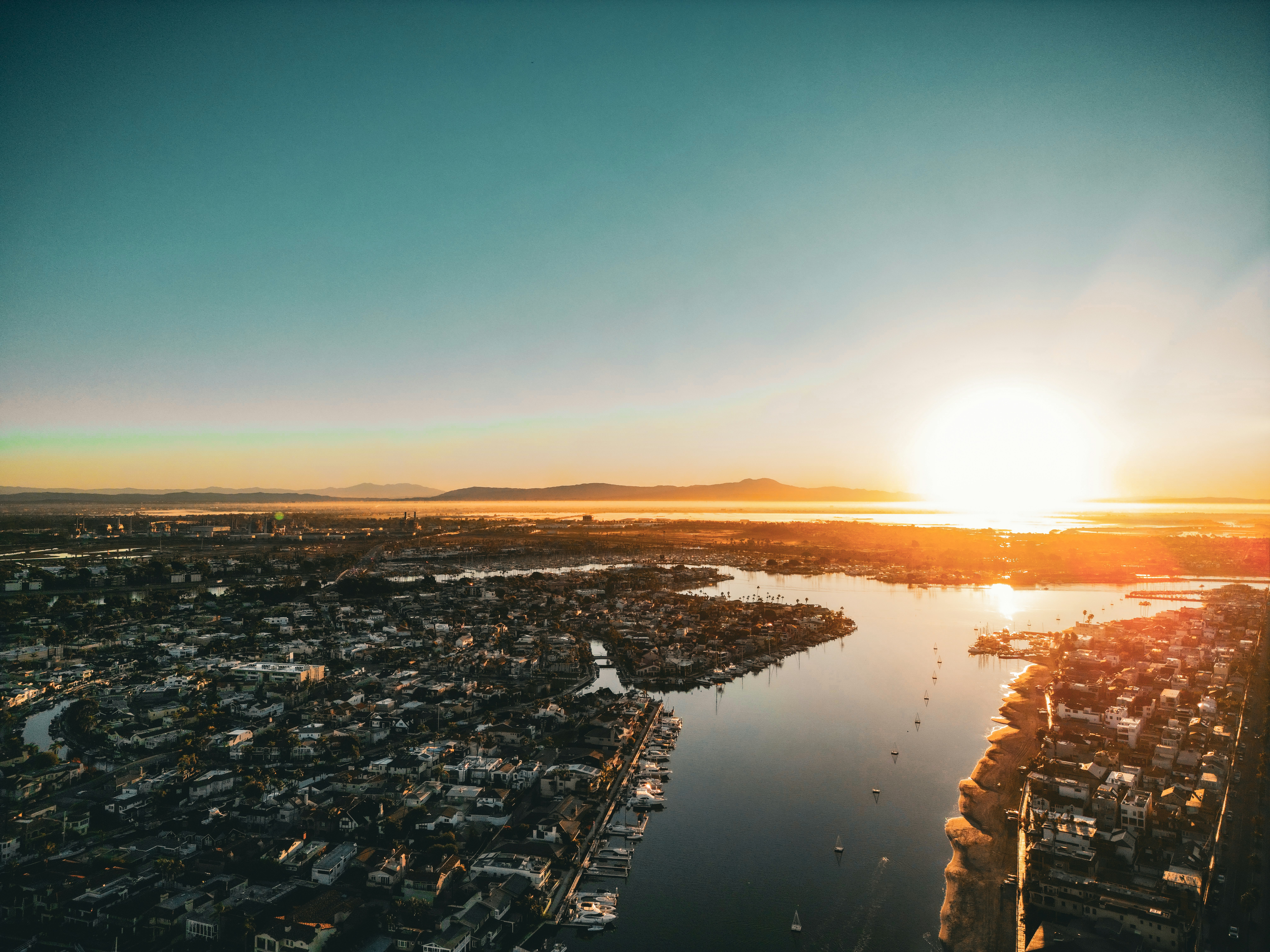 A calm coastal landscape at golden hour symbolizing a better, simpler way to sell commercial real estate off-market