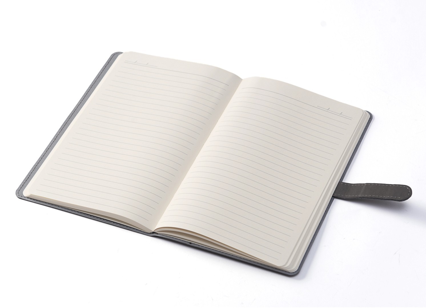 Open notebook displaying lined pages with date headers.