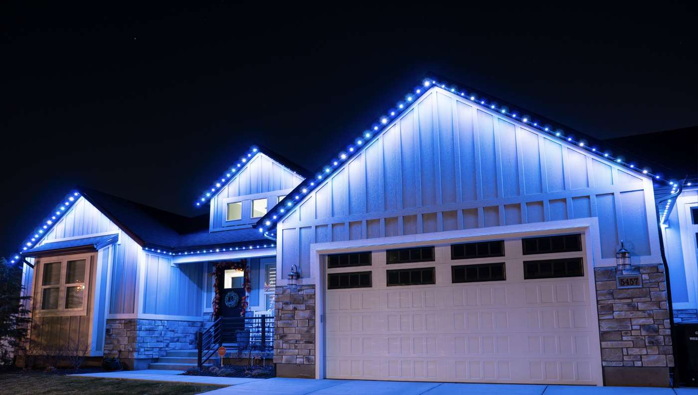 Multi-color LED lighting on luxury home exterior