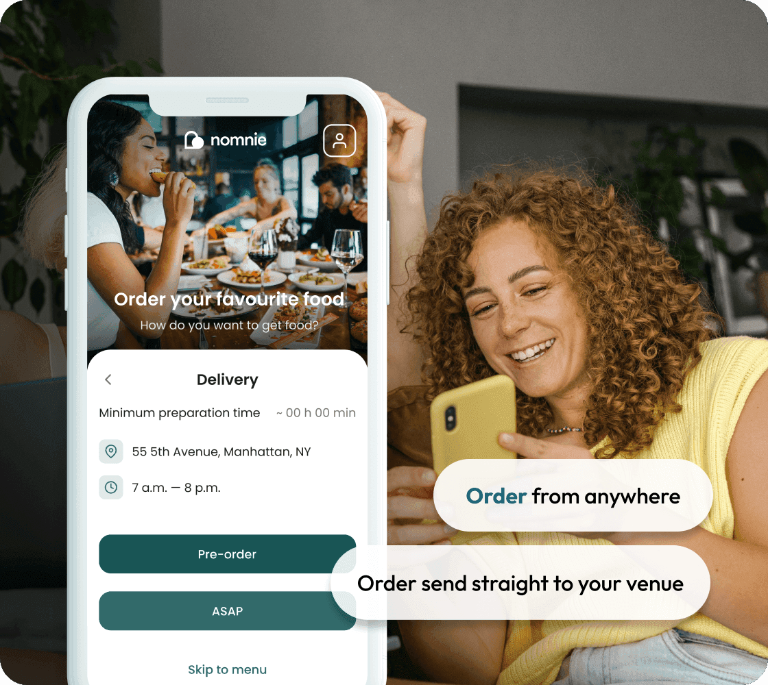 happy business owner with higher order volume with online ordering for restaurant