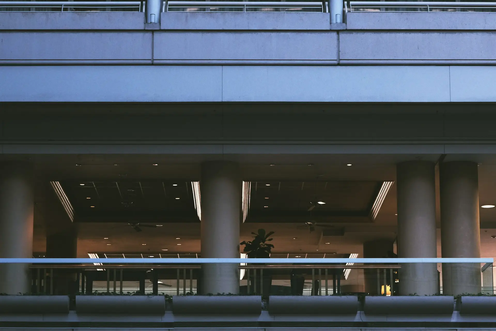 a building with columns and a clock on it