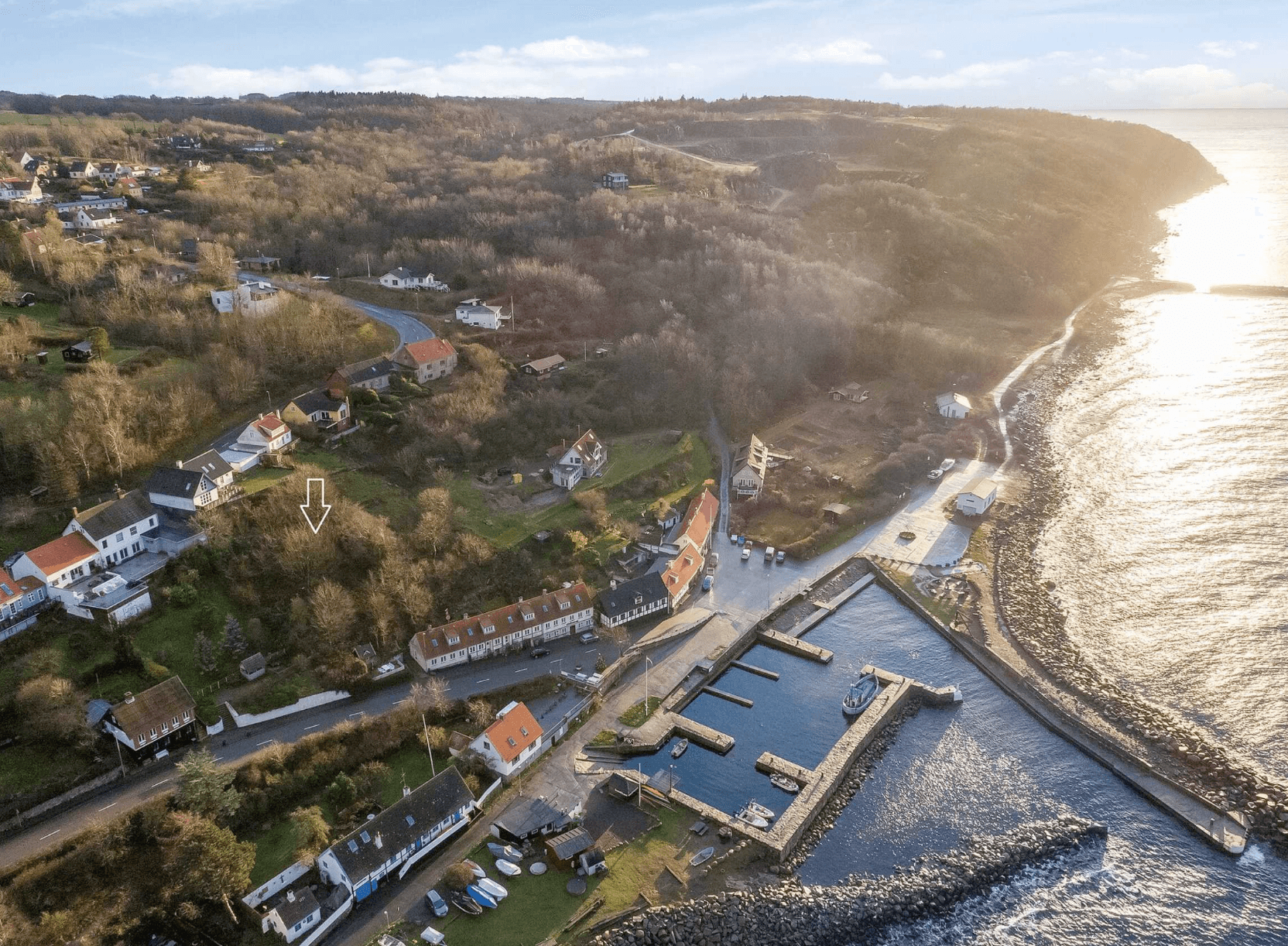 round brown wooden table near window