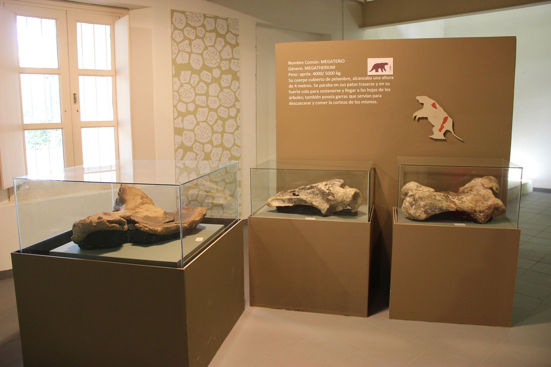 Interior of a cafe or workspace with several people at tables