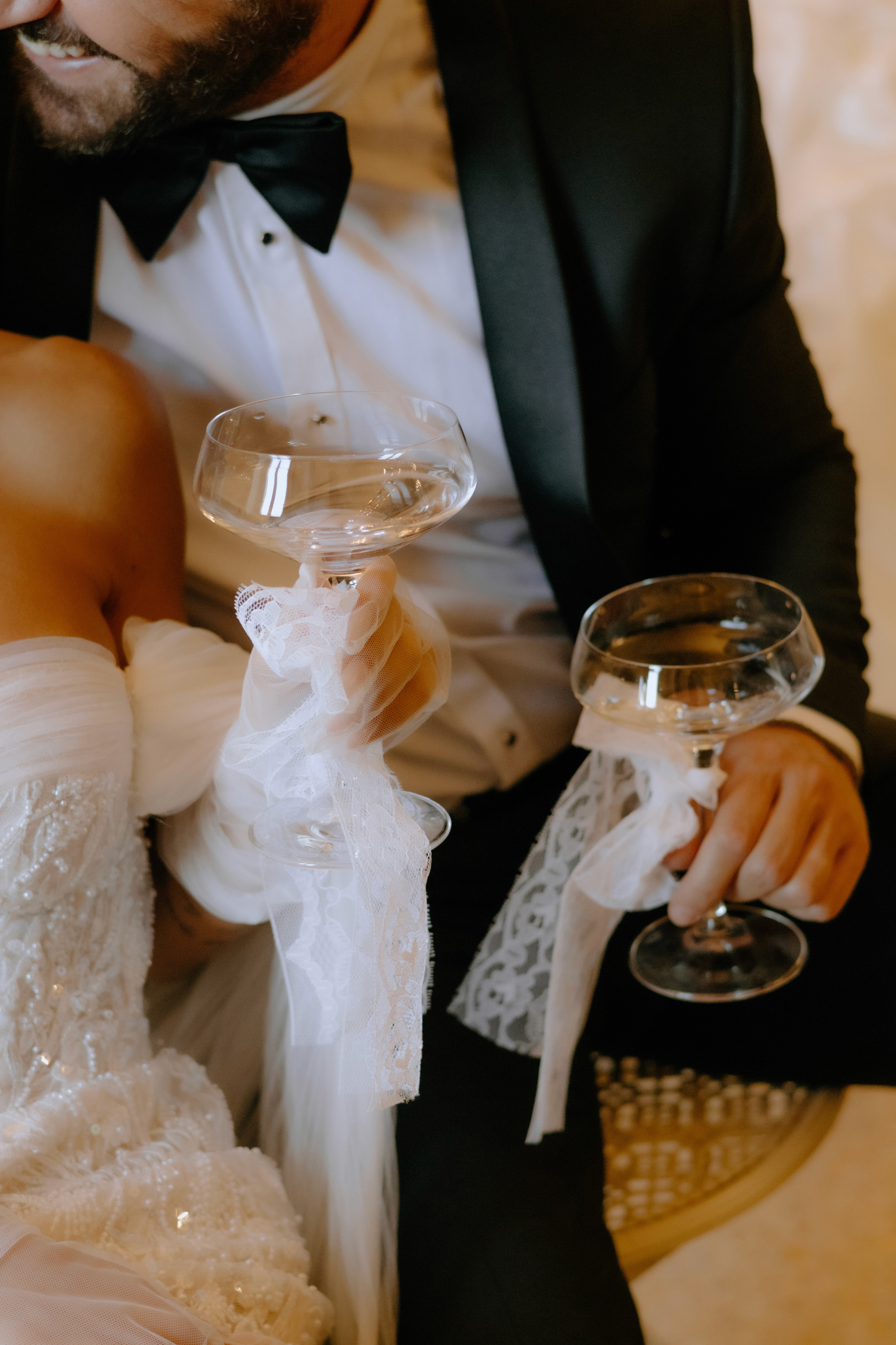 Flat lay of makeup essentials: brush, foundation, and powder on a beige background