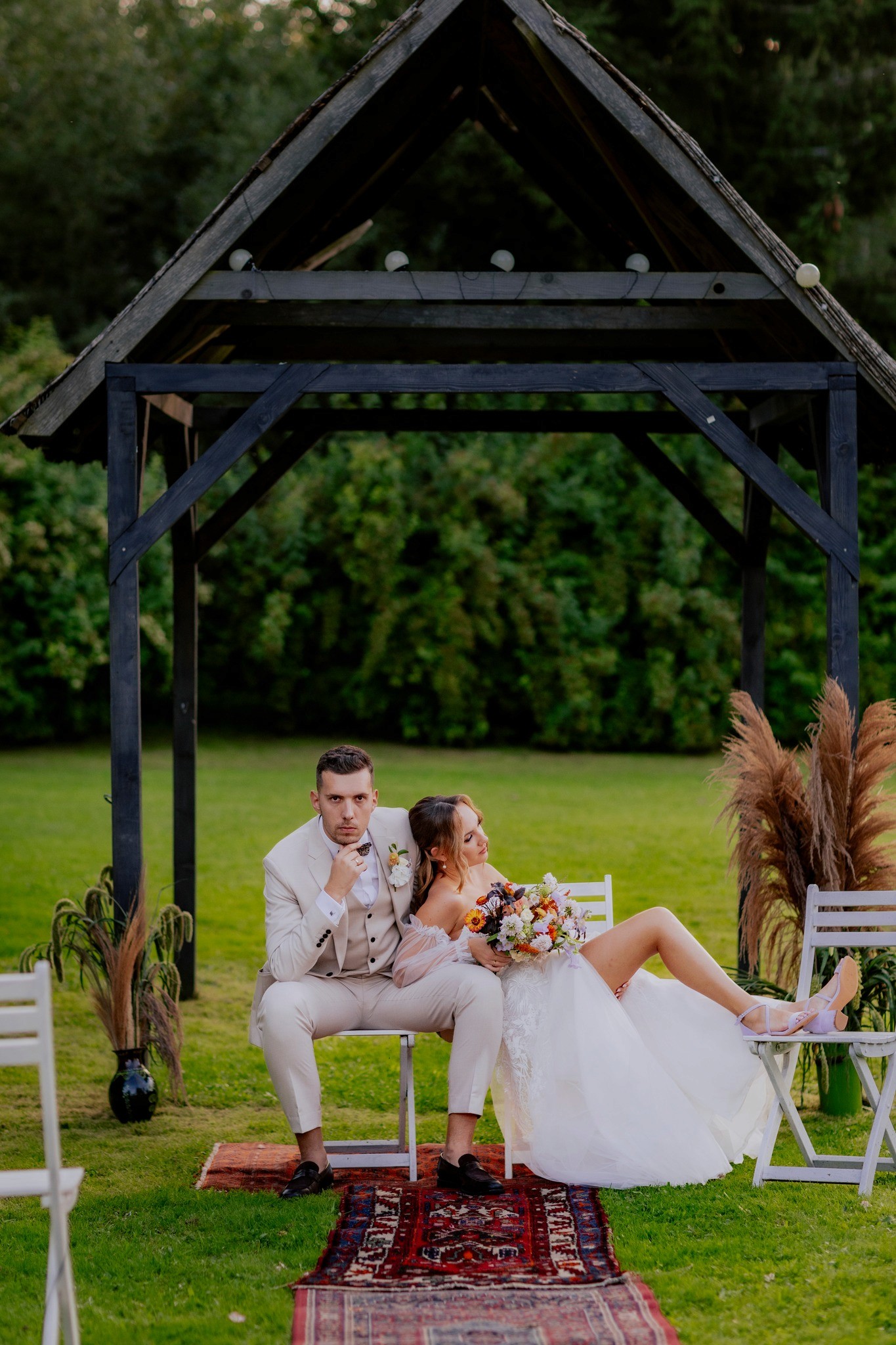 A joyful couple stands together.